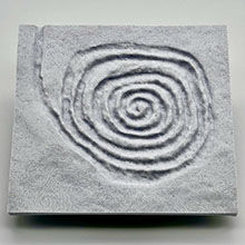 Thermoform tactile representing Chaco Canyon spiral petroglyph