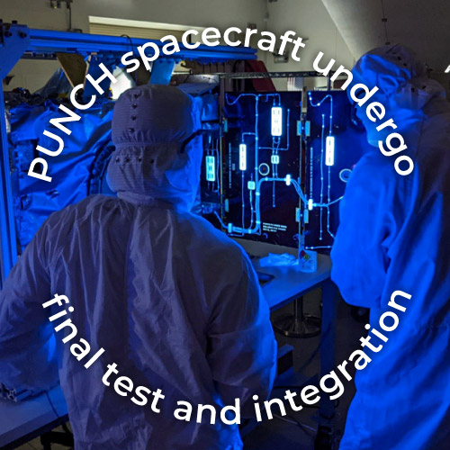 Technicians use fluorescence to inspect 
		wiring on a PUNCH spacecraft, in the runup to integration with SPHEREx (conical shroud in background) 
		and their joint launch deployer.